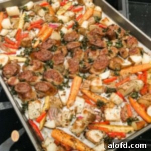 One-Pan Chicken Sausage and Roasted Vegetables 8 A sheet pan of sausage and mixed vegetables.