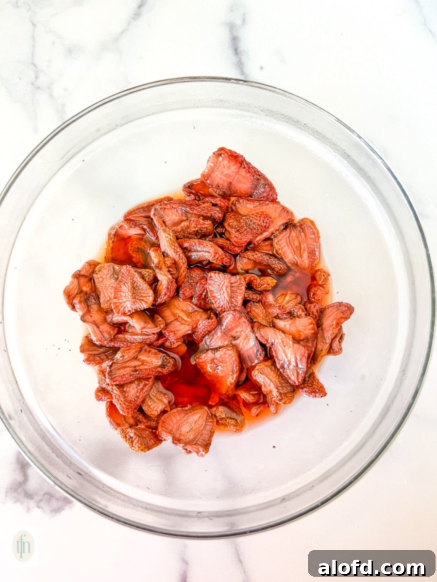 Naturally Dried Strawberries 8 Rehydrating dried fruit in a bowl of water.