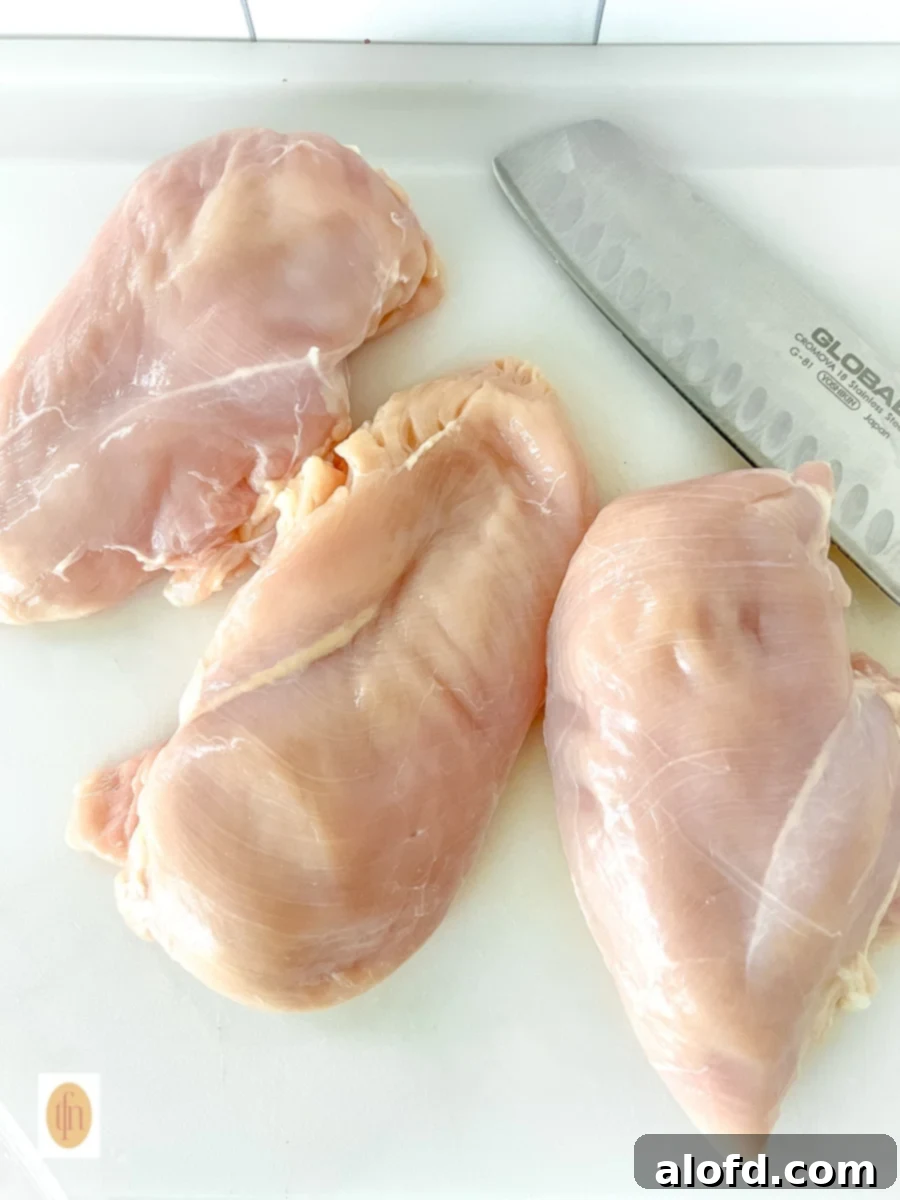 Three boneless skinless pieces of poultry.