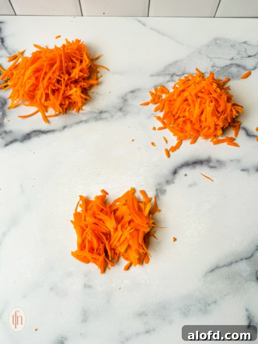 Shows three ways of shredding carrots: with a box grater, in a food processor, and with a vegetable peeler.