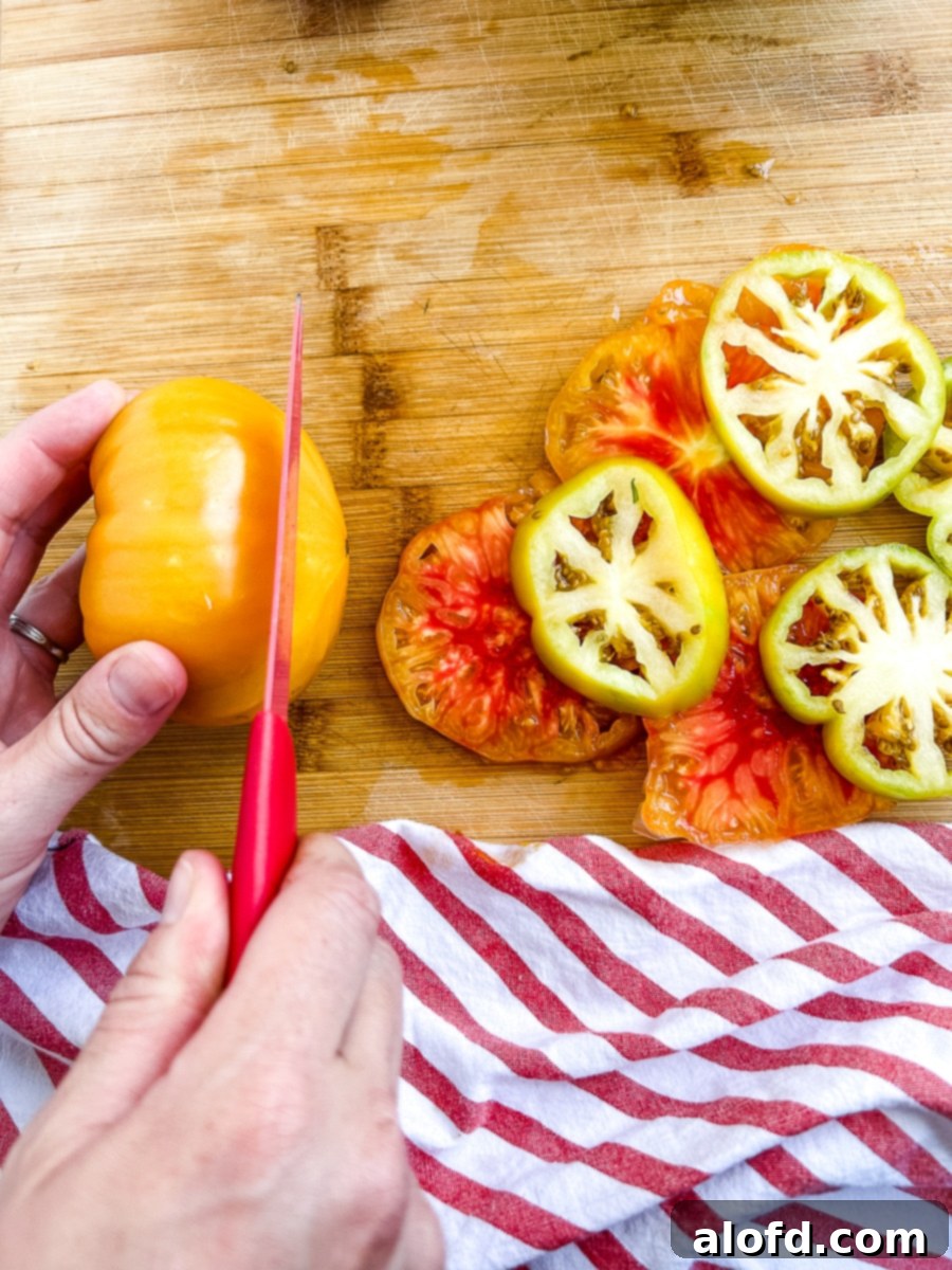 Using a serrated knife to slice tomatoes.