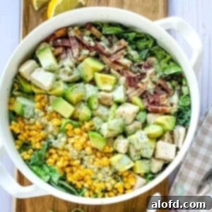 The Ultimate Green Goddess Salad 14 Panera chicken bacon cobb salad in a white bowl.