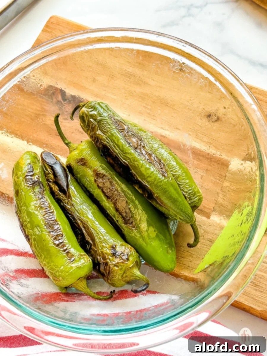 Looking down into a dish of pan roasted jalapenos.