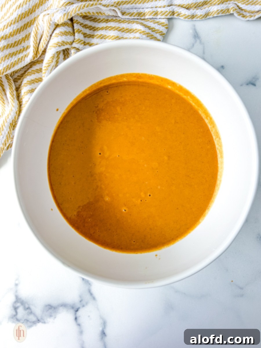 Velvety Pumpkin Custard Pie 7 Bowl of pumpkin custard pie filling.