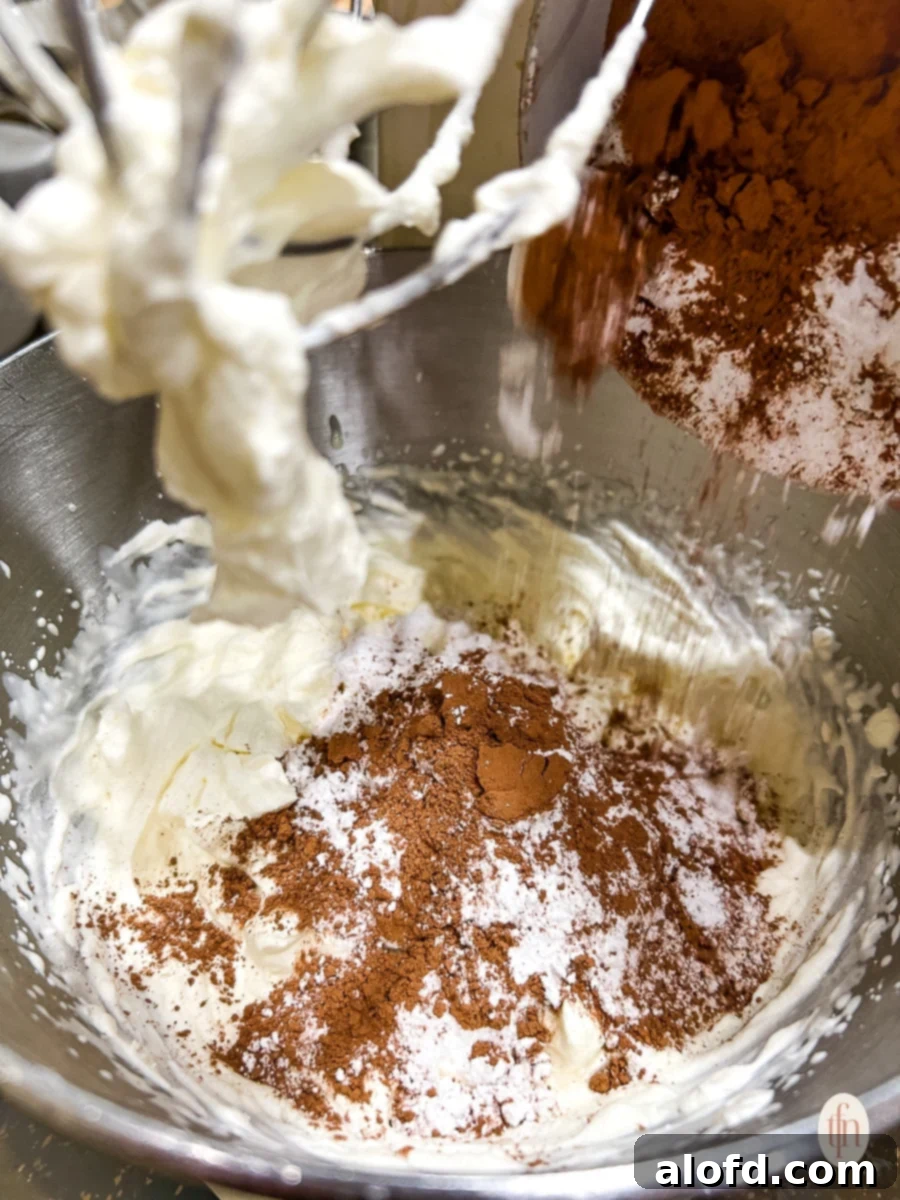 Simple Decadent Chocolate Mousse 9 Whipping ingredients in a big bowl.