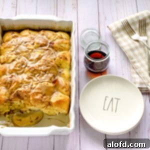 Effortless Overnight French Toast Bake 10 A close-up image of a delicious Oven Baked French Toast Casserole with maple icing, perfect for breakfast or brunch.