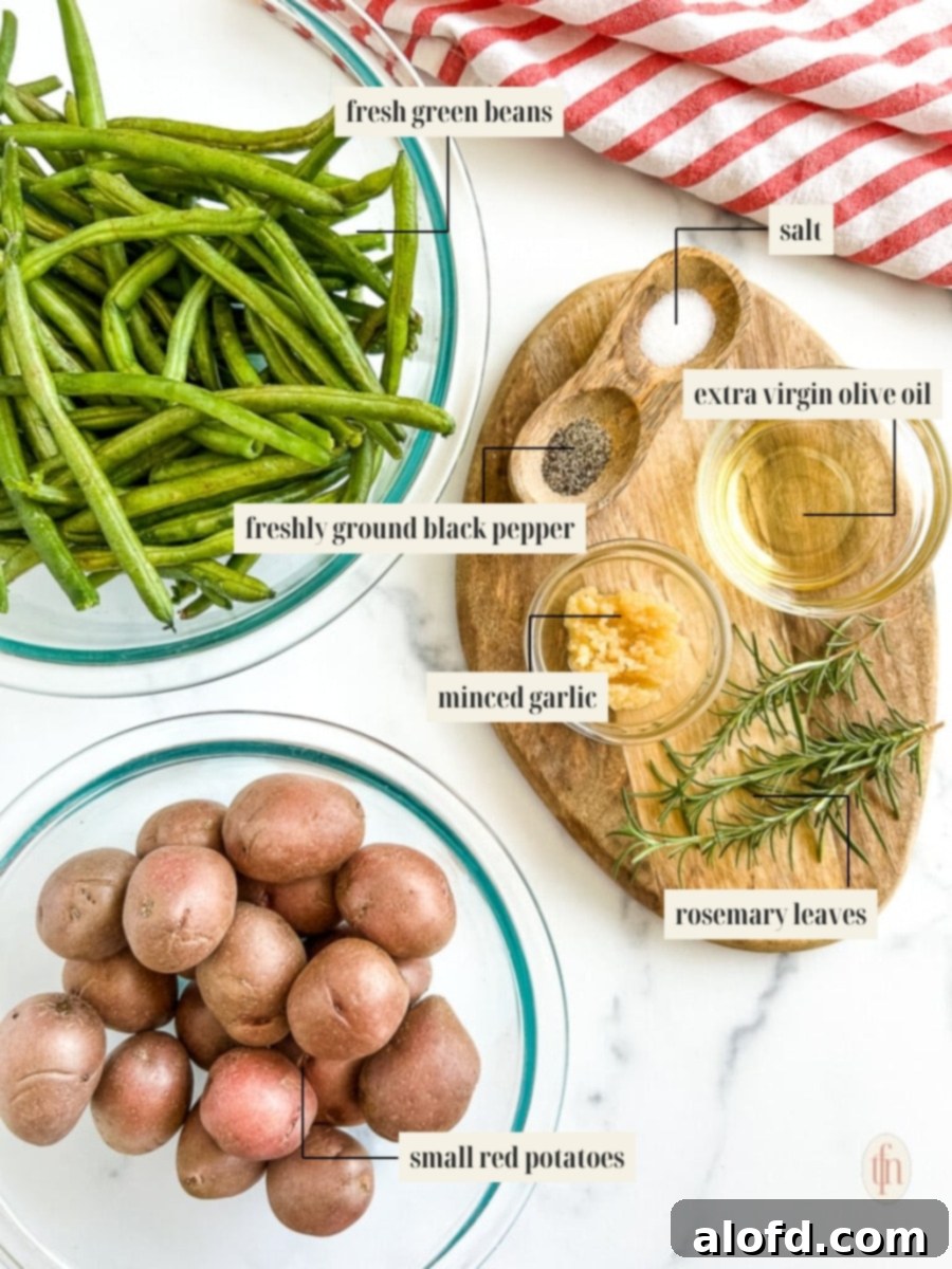 Garlic Herb Roasted Green Beans and Potatoes 4 Labeled ingredients for a roasted vegetable recipe, including potatoes, green beans, olive oil, and herbs.