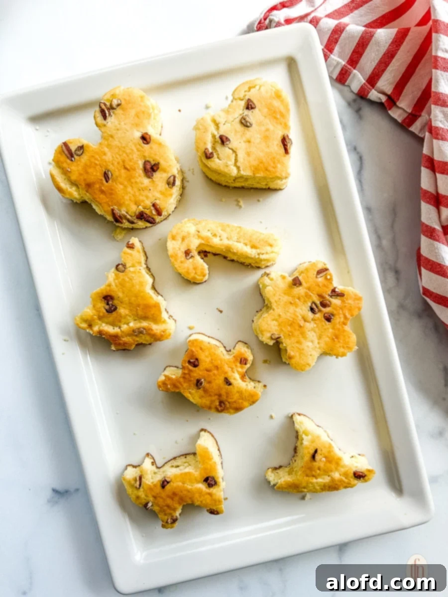 Effortless Sheet Pan Pancakes from Mix 2 Sheet pan pancakes from a mix cut out into holiday shapes on a sheet pan, ready to be served for a festive breakfast.