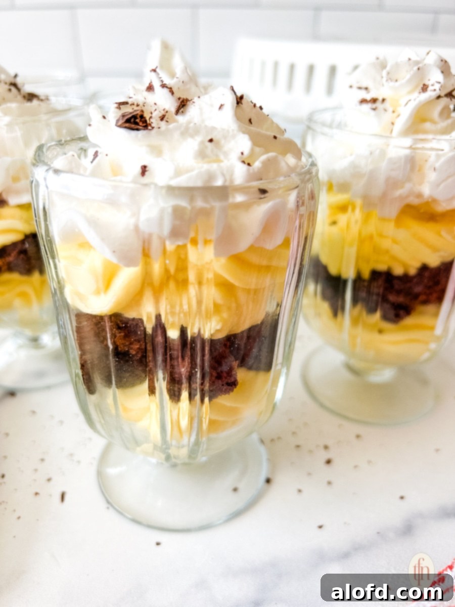 Velvety Vanilla Cloud 3 Close up of a glass filled with vanilla mousse parfait.