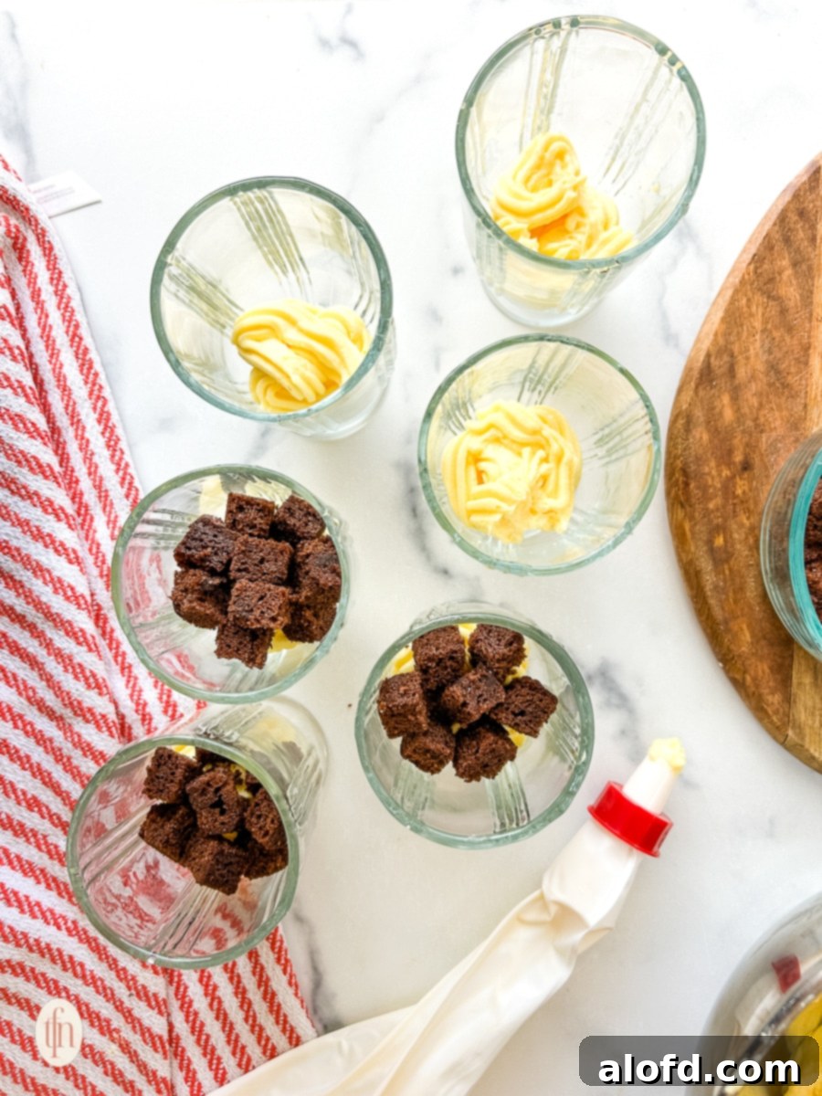 Velvety Vanilla Cloud 8 Glass bowls filled with mousse and pudding.