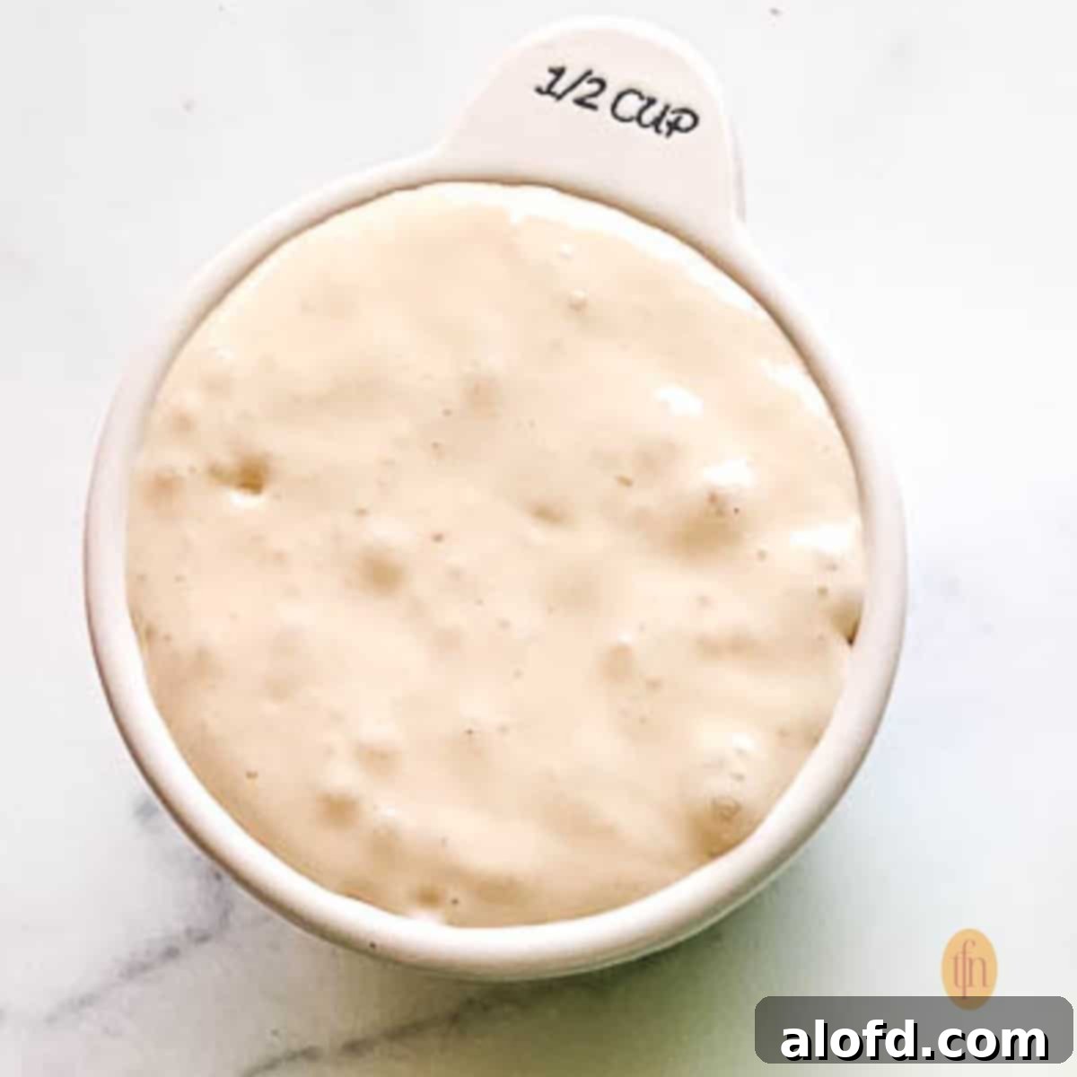 Sourdough Discard Demystified 7 A half cup of sourdough starter.