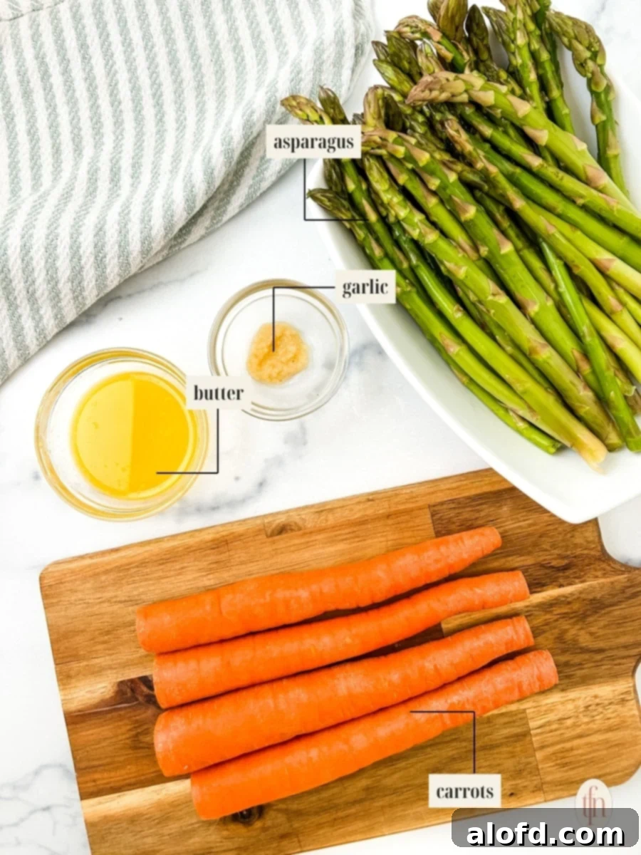 Golden Roasted Carrots and Asparagus 4 A close-up image showing fresh carrots, asparagus, melted butter, minced garlic, and a shaker of all-purpose seasoning, clearly labeled for easy identification.