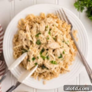 Sweet and Tangy Slow Cooker Honey Mustard Chicken 13 chicken and rice on a plate.