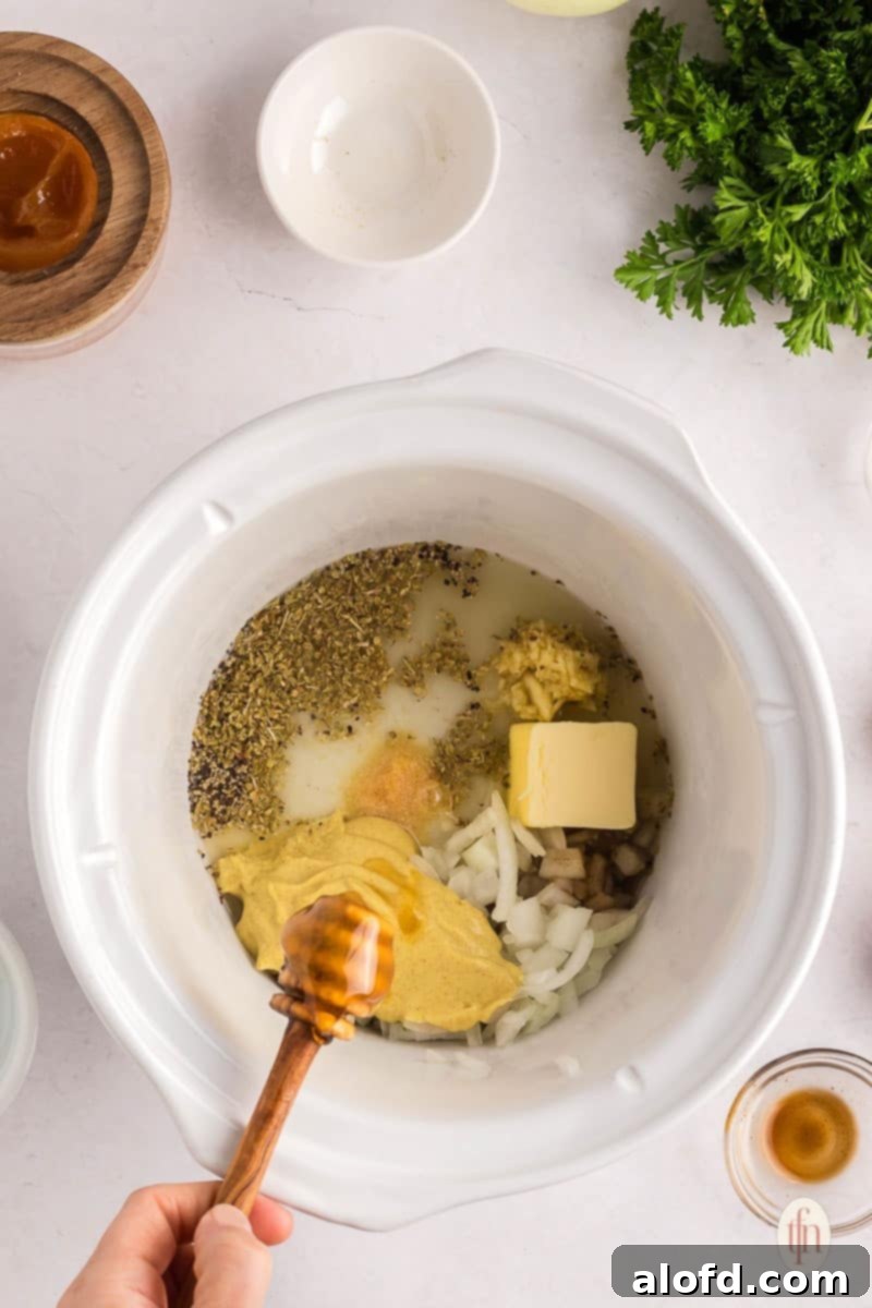 Sweet and Tangy Slow Cooker Honey Mustard Chicken 6 mixing ingredients in the slow cooker.