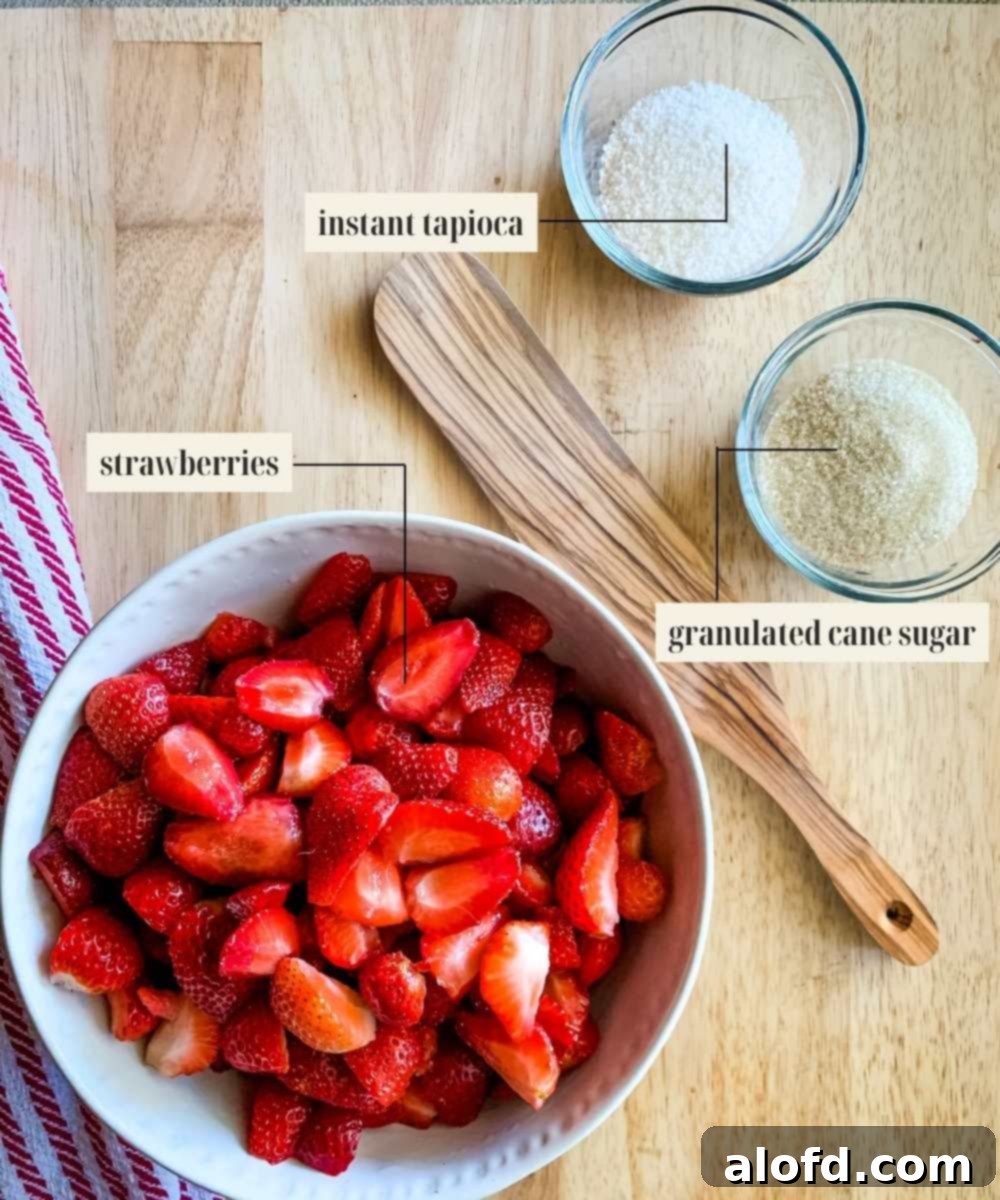 Easy Homemade Bisquick Strawberry Cobbler 5 Labeled ingredients for the strawberry filling of Bisquick cobbler.