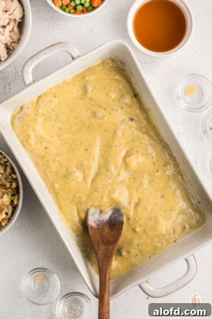 The creamy sauce for the casserole, after all liquid ingredients and seasonings have been thoroughly mixed.