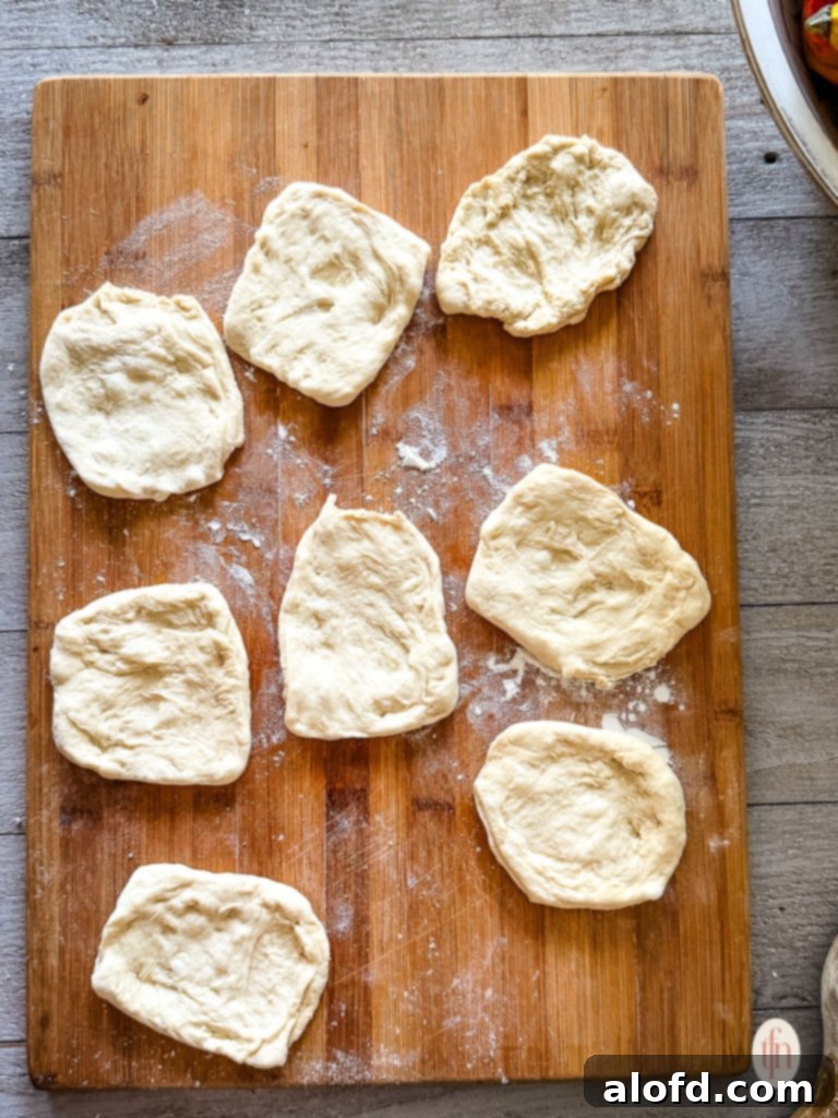 8 dough pieces rolled flat.
