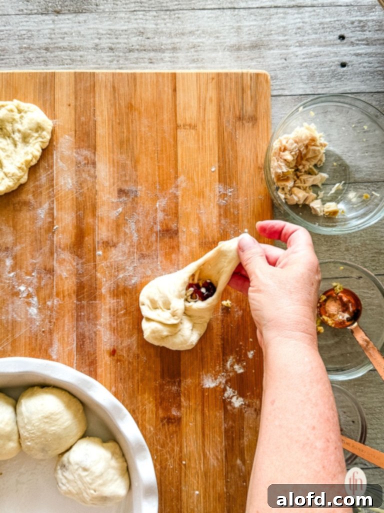 Sealing up the roll before baking.