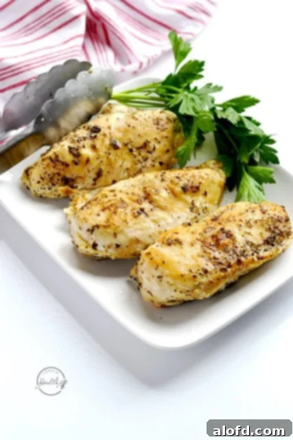 Effortless Instant Pot: 5-Ingredient Meals 10 Perfectly cooked Instant Pot Chicken Breasts on a serving plate, ready to be enjoyed or used in other recipes.