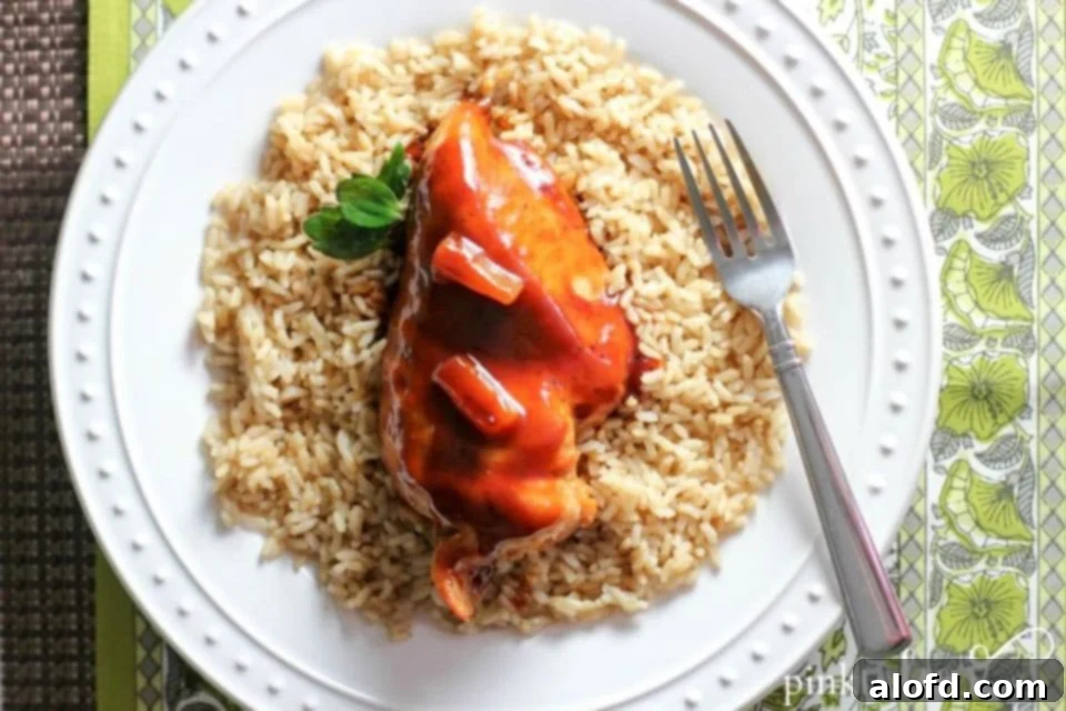 Effortless Instant Pot: 5-Ingredient Meals 11 Sweet and savory Hawaiian Chicken cooked in the Instant Pot, garnished with pineapple and green onions.