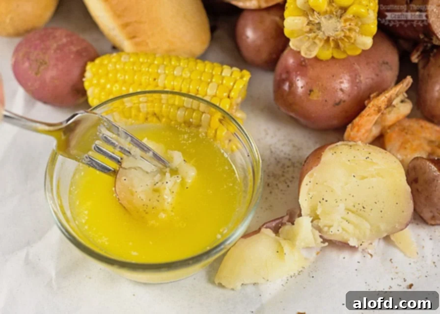 Effortless Instant Pot: 5-Ingredient Meals 19 A vibrant photo of potatoes, shrimp, and corn from a delicious country shrimp boil made in a pressure cooker.
