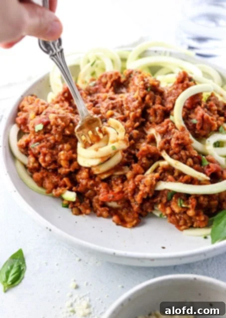 Effortless Instant Pot: 5-Ingredient Meals 25 Rich Vegetarian Bolognese in the Instant Pot, made with just 5 ingredients, served over pasta.