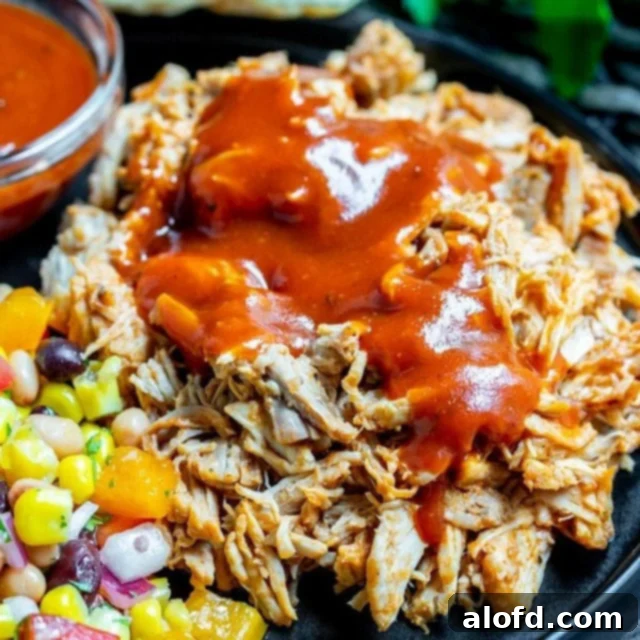 Effortless Instant Pot: 5-Ingredient Meals 4 Succulent Pulled Pork cooked in an Instant Pot, ideal for sandwiches or tacos, made with only a few ingredients.