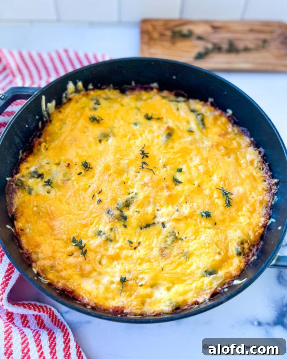 Reinventing Your Thanksgiving Turkey 7 A bubbling skillet of chicken casserole topped with golden hash browns.