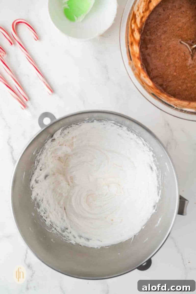 Decadent Peppermint Chocolate Cupcakes 12 A bowl of whipped cream, fluffy and ready for flavoring.