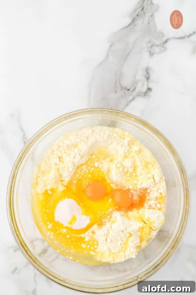 Raw ingredients in a glass mixing bowl.