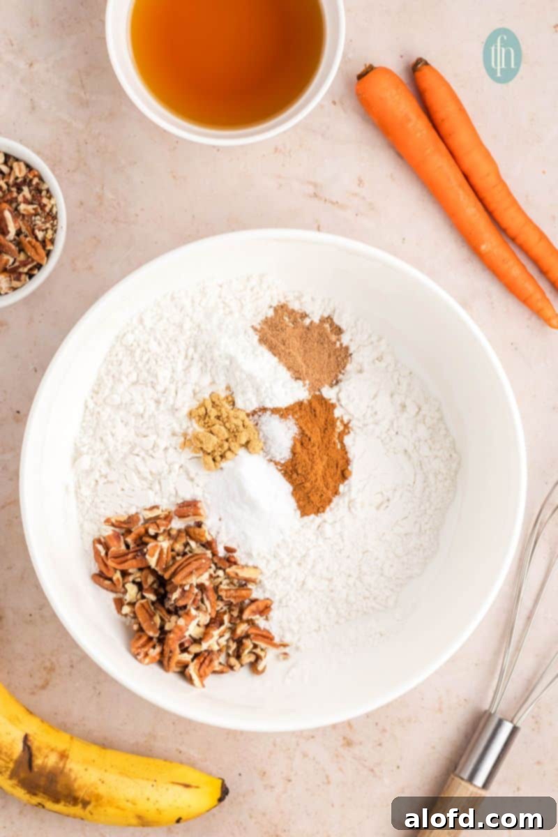 Farmhouse Carrot Cake Loaf 9 Dry raw ingredients in a bowl.