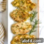 March Flavor Feast: Irresistible Dinner Ideas 19 Four perfectly golden and crispy panko breaded chicken breasts artfully arranged on a pristine white serving platter.