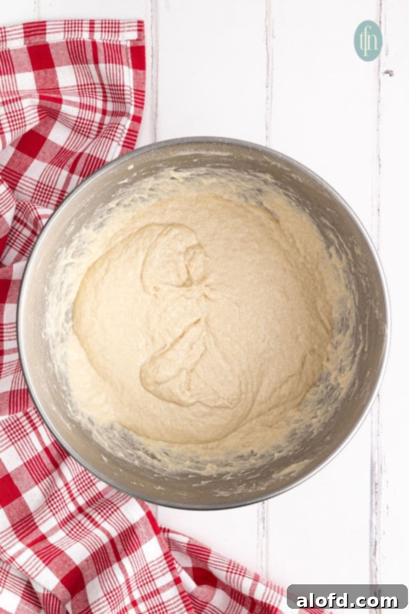 A bowl of freshly mixed sourdough focaccia dough, ready for its first rise.