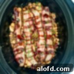 Calico beans in the crock pot, showing a colorful and hearty dish.