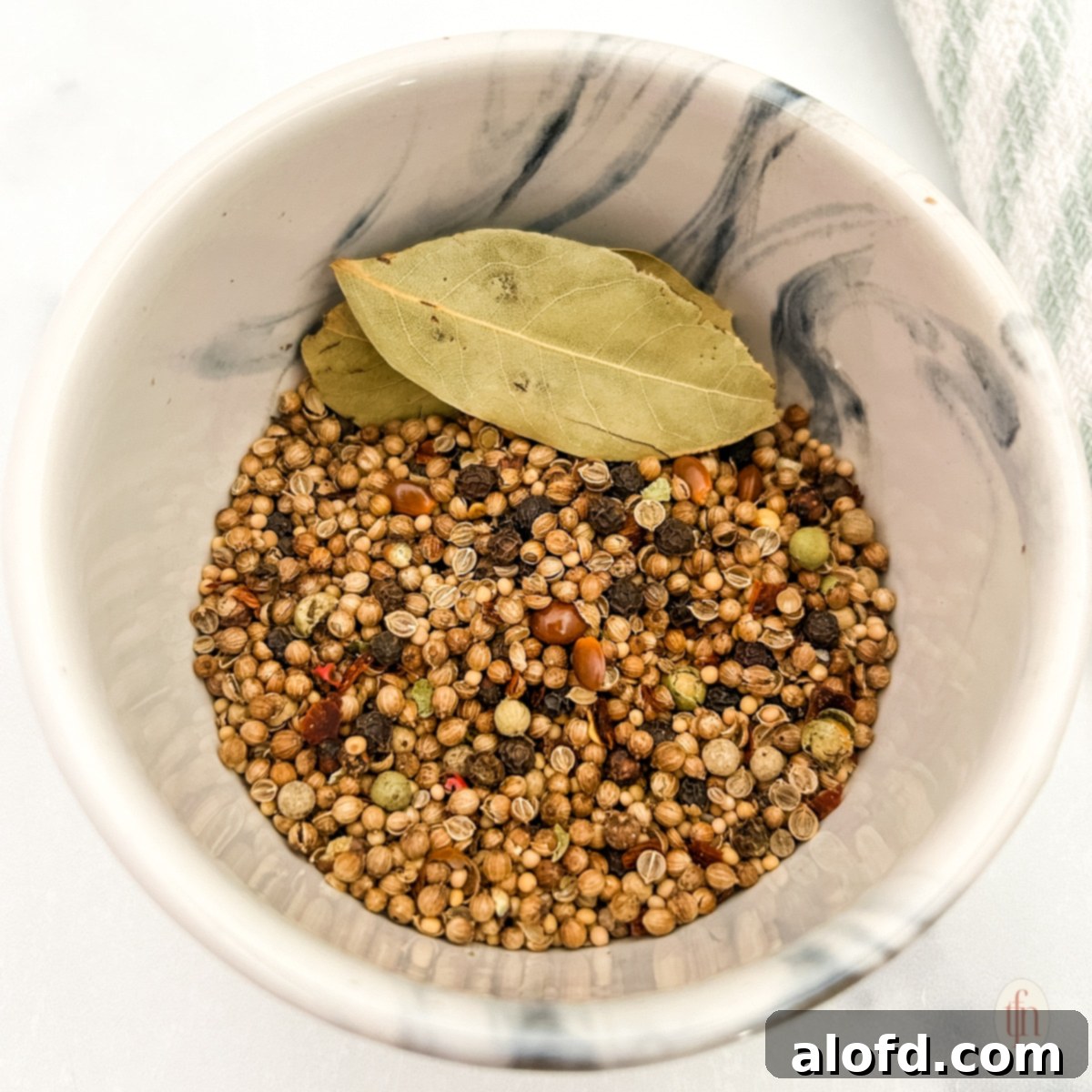 St Patricks Day Feast Ideas 16 A close-up of corned beef seasoning in a bowl, highlighting the aromatic spices.