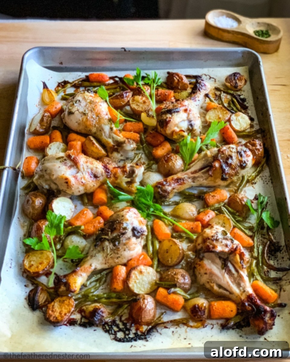 sheet pan of balsamic chicken and veggies from the oven