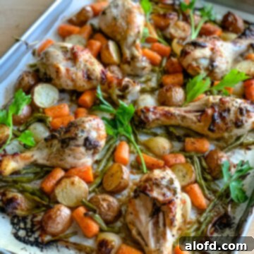 A sheet pan of chicken drumsticks.
