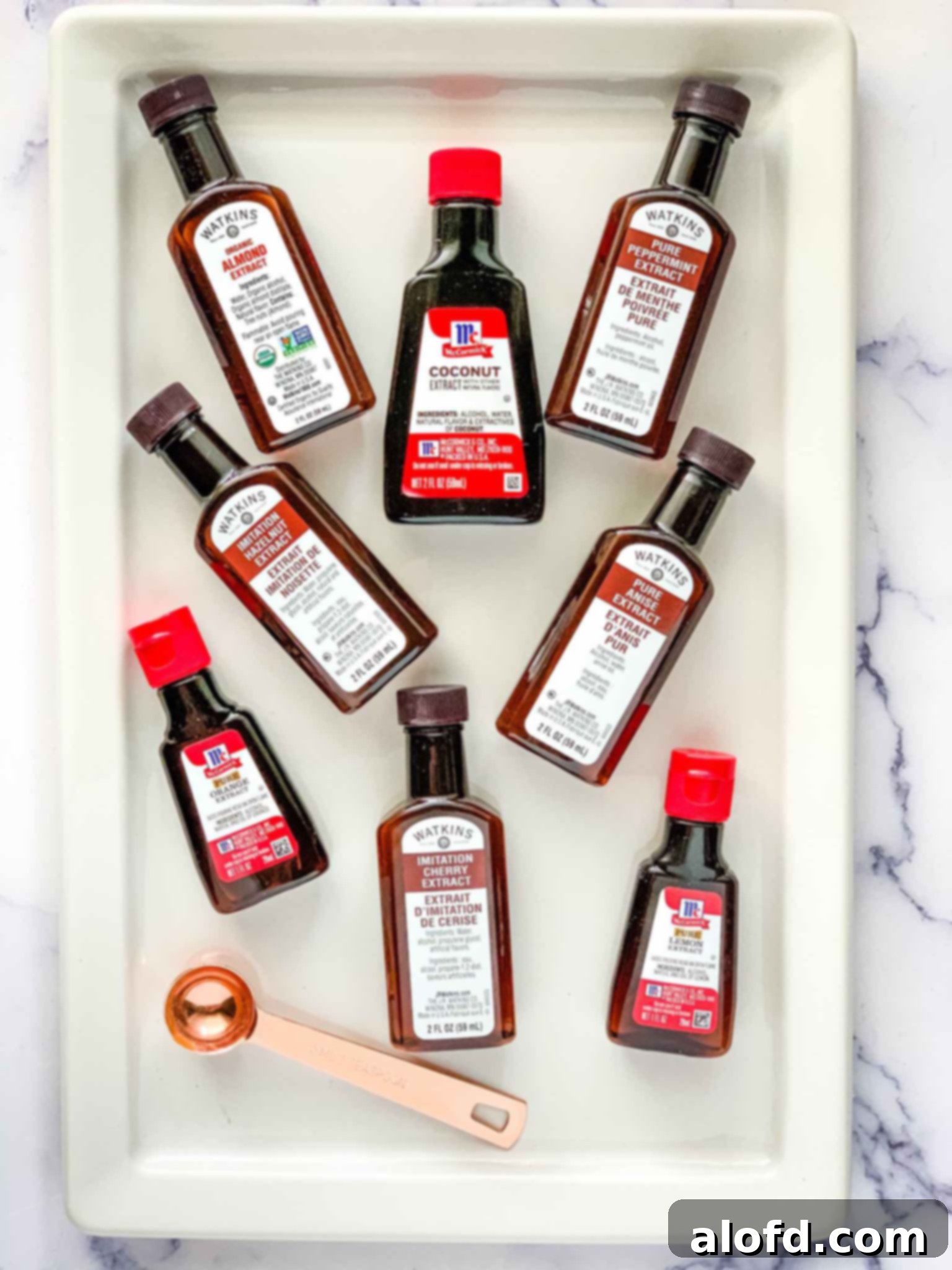 A display of different extract flavors, highlighting the variety available for baking.