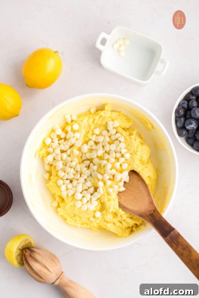 Lemon Blueberry Bliss Bites 11 White chocolate chips stirred into the cookie batter.