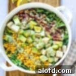 Light and Vibrant Spring Dinners 13 Panera chicken bacon cobb salad in a white bowl.