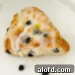 Light and Vibrant Spring Dinners 6 Blueberry sourdough scones on a white plate.