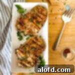 Platter with two tender and juicy buttermilk pork chops.