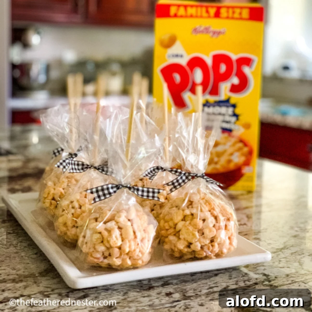 Golden Corn Pops marshmallow treats neatly arranged on a white plate, ready to be served. A fun, crispy, and sweet snack perfect for parties or a quick treat.