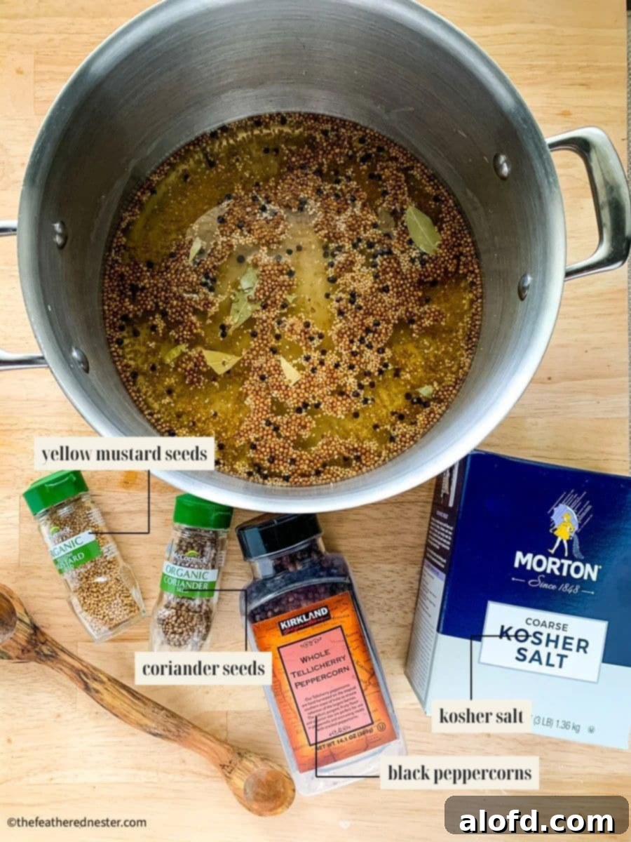 Tender Buttermilk Turkey Breast 4 A collection of ingredients laid out on a table for making buttermilk turkey brine, including spices, herbs, garlic, and buttermilk.