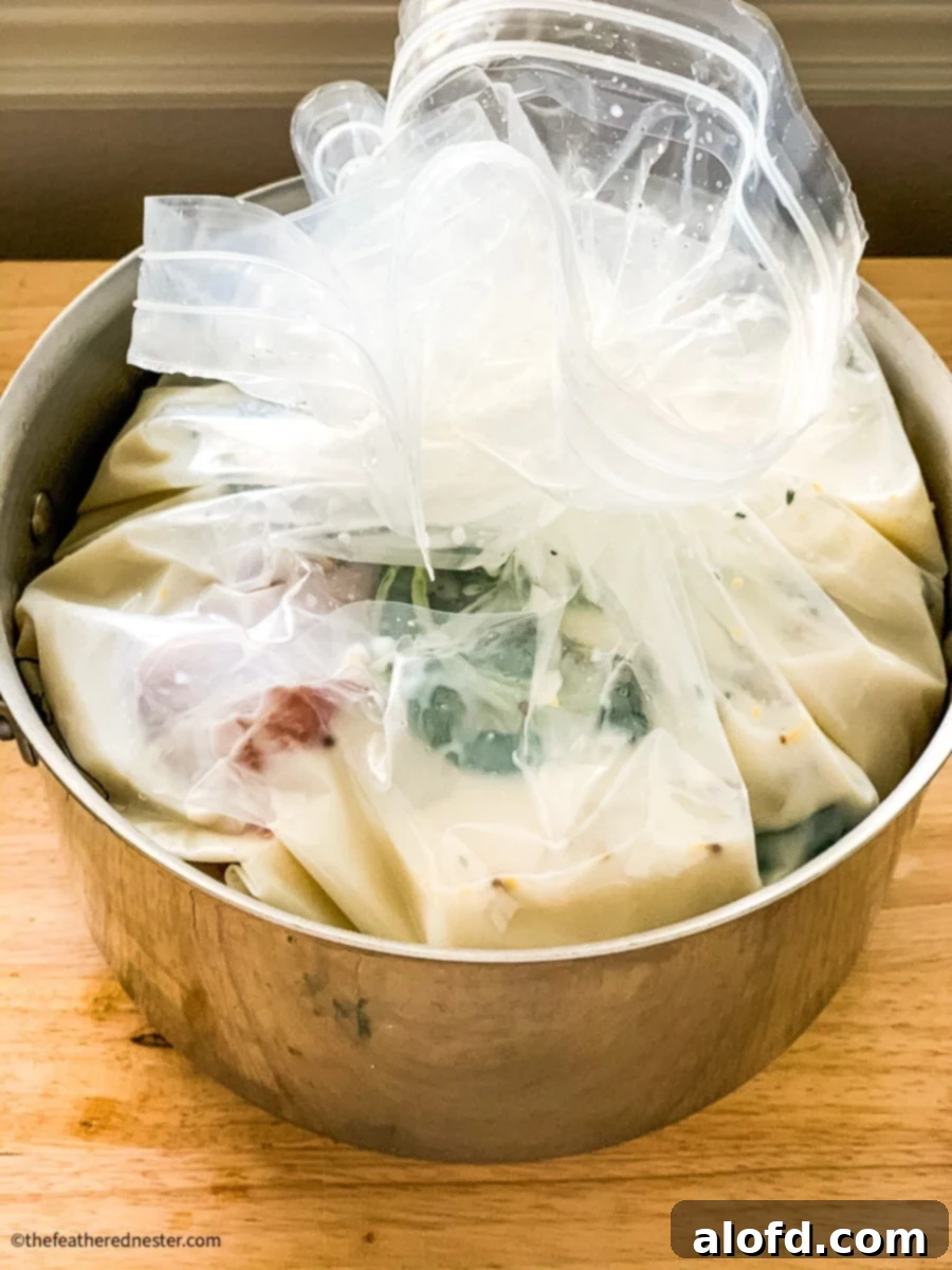 Tender Buttermilk Turkey Breast 6 A turkey breast submerged in buttermilk brine within a heavy-duty, sealed food storage bag, placed inside a large stock pot for refrigeration.