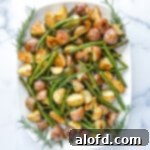 Platter of oven roasted vegetables and diced russets.