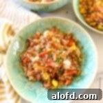 Blackstone fried rice in a green bowl ready to serve.