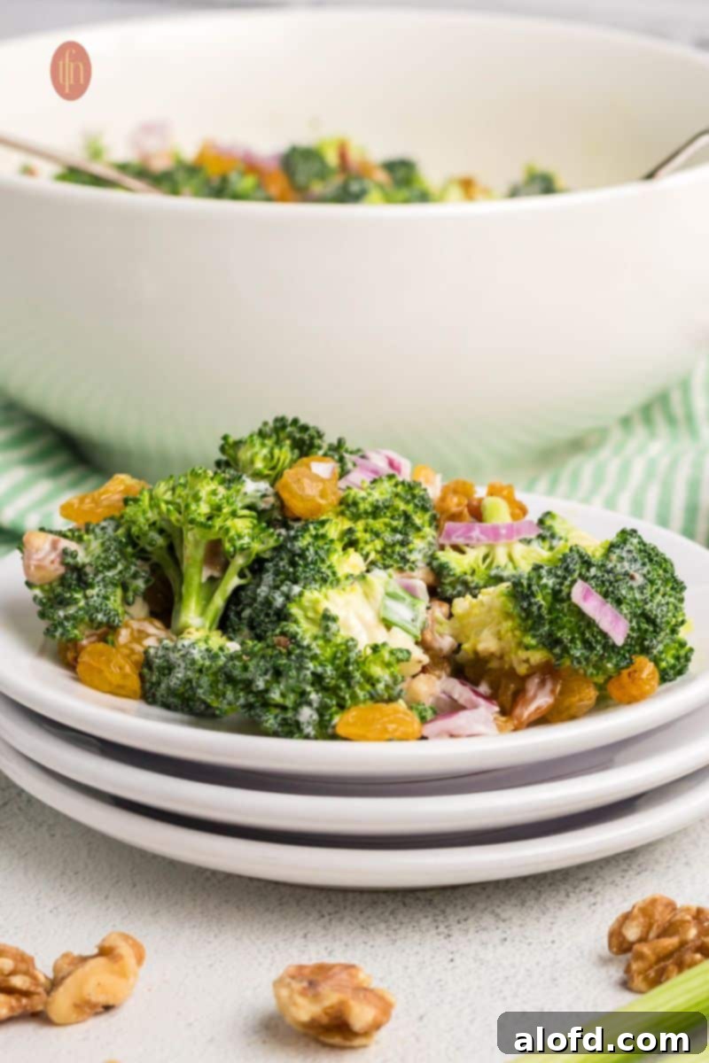 Broccoli salad in a white plate.