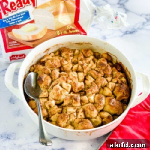 Baked apple fritter breakfast casserole, golden brown and inviting, ready to be served.