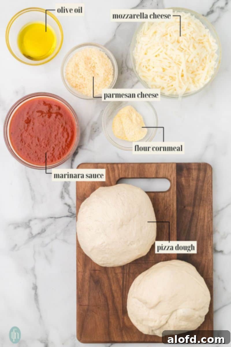Homemade Pizza with a Crust Made from Scratch 4 Labeled ingredients for homemade pizza: olive oil, mozzarella, Parmesan, cornmeal, marinara sauce, and pizza dough.